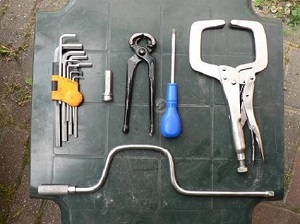 The tools required to remove the throttle body of an Ecotec engine